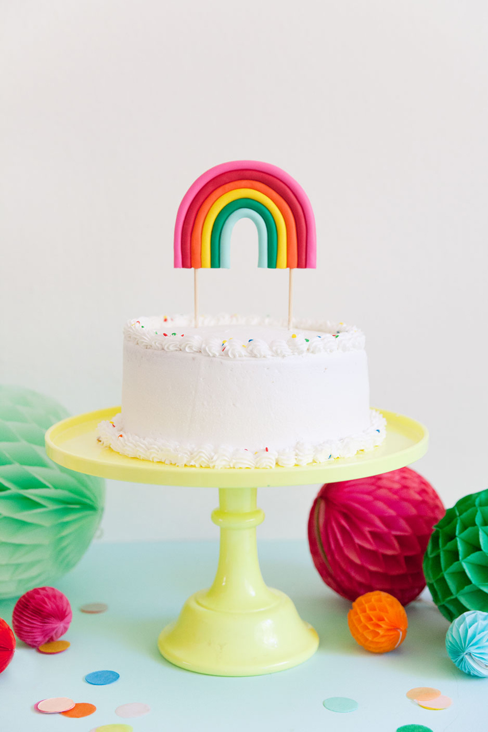 This DIY rainbow cake topper is the cutest and for sure the life of the party. Perfect for any rainbow or unicorn themed birthday parties.