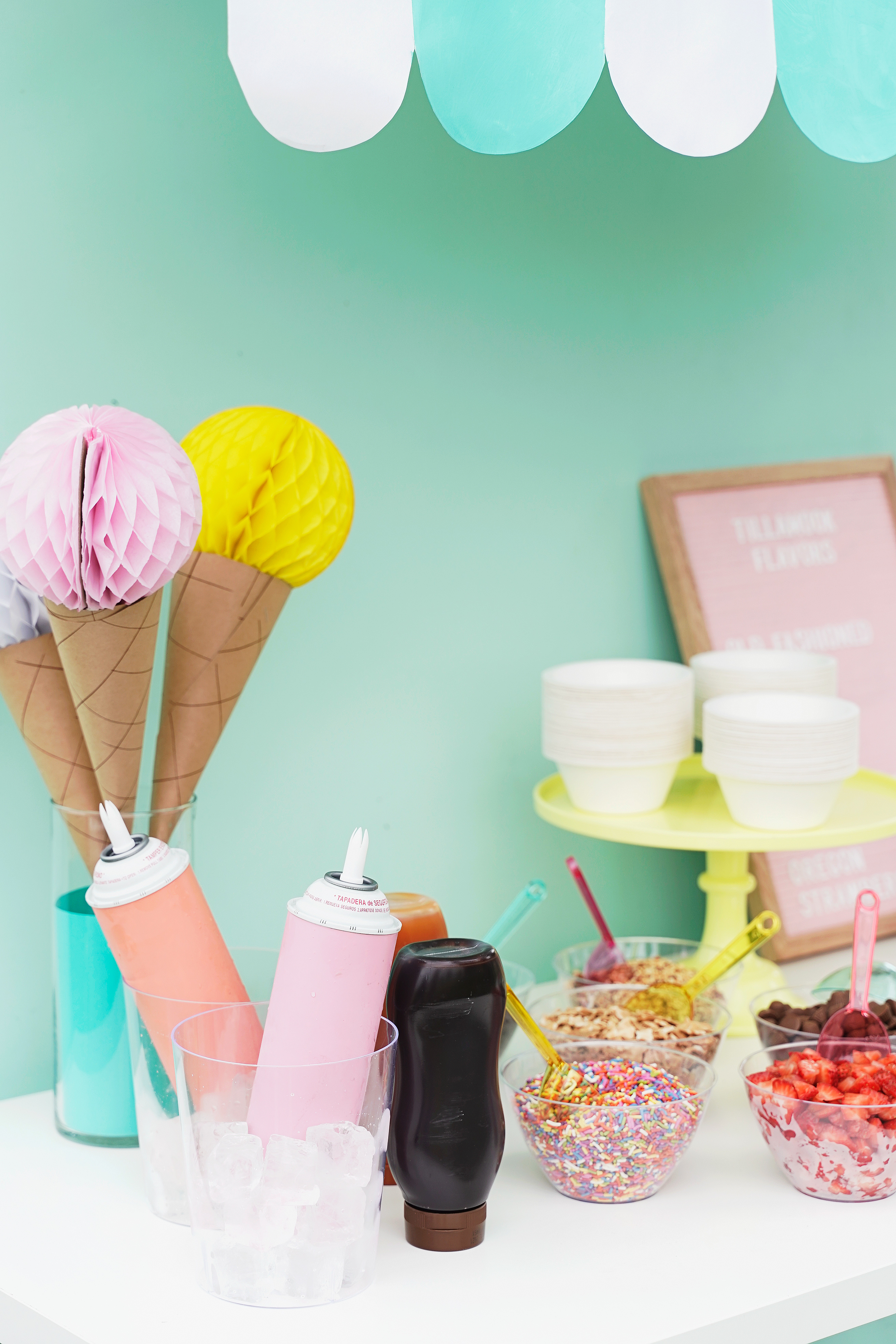 Learn how to throw the most amazing ice cream party EVER this summer! Complete with adorable decorations and the most delicious ice cream. 